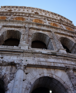 italy_rome_colosseum_amputheater_ancient_nero_statue_gladiators_fighters_animals_death_crowds_iconic_monument_popular_amazing_site_side_view_400